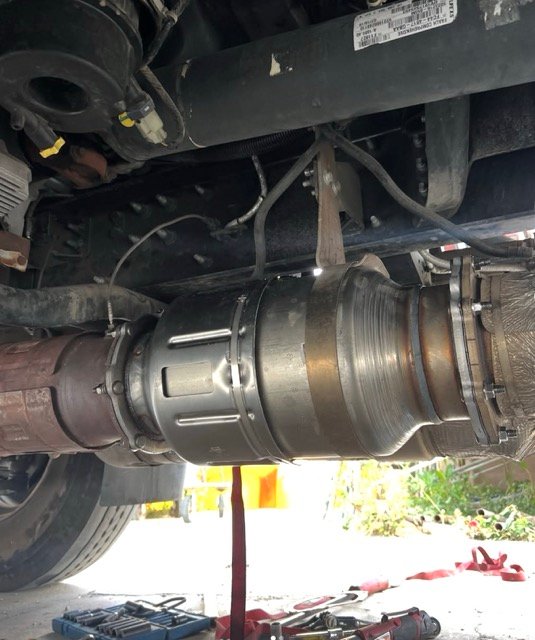 image of truck maintenance for a trucking company